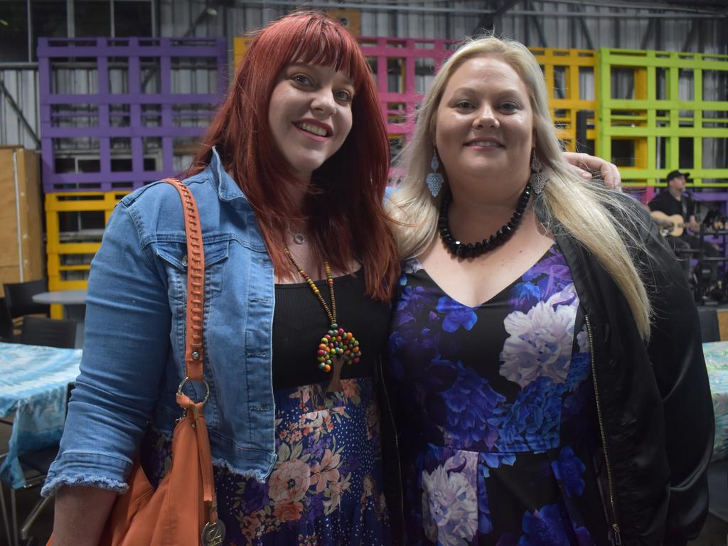 (L) Leelee West and Neighbourhood Centre CEO Tanya Stevenson enjoy the opening of the Neighbourhood Hive on Friday night.