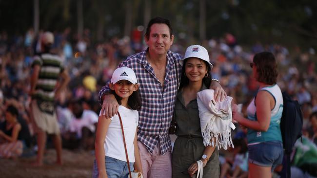 Michael , Khemeka and Layla Totham joined thousands of Territorians along Mindil Beach to celebrate Territory Day. Picture: Glenn Campbell