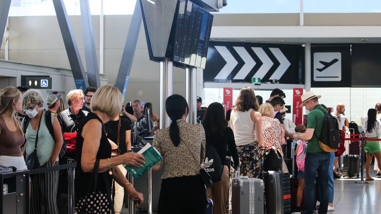 Passengers are seen queuing in long lines to check in at the Domestic Airport in Sydney on Wednesday, during what airport officials are calling the facility’s busiest season since 2019. Picture: NCA Newswire / Gaye Gerard