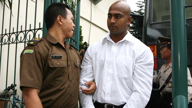 Myuran Sukumaran escorted by Prosecutor as arrived to Denpasar District Court for his trial. Picture: Lukman S Bintoro