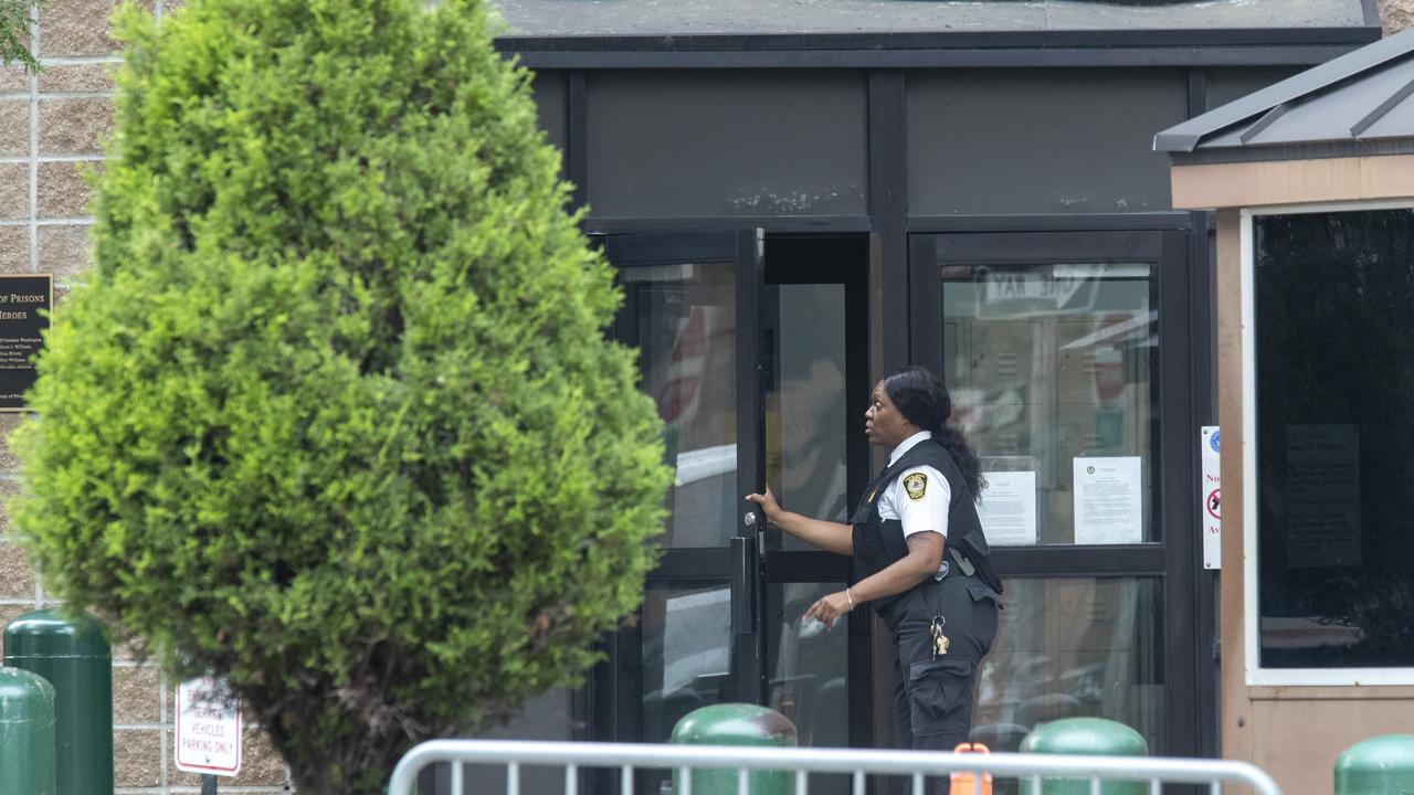 An employee enters the Metropolitan Correctional Center, where Epsetin died. Picture: Mary Altaffer/AP Photo