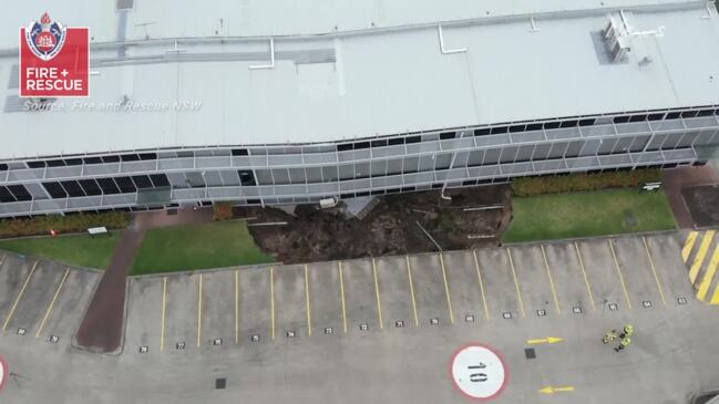 Sydney building buckles due to sinkhole