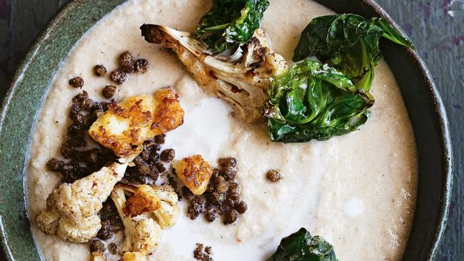 Creamy cauliflower coconut soup with crispy lentils and haloumi.