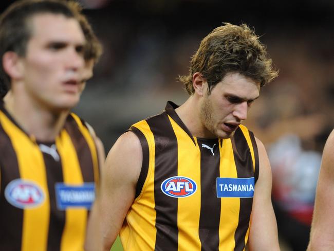 A dejected Grant Birchall leaves the field after the Hawks were whacked by the Bombers in early 2010. President Jeff Kennett would put the Hawks on notice.