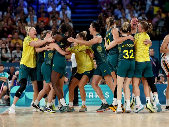 PARIS, FRANCE - AUGUST 11: Team Australia celebrate victory during the Women's Bronze Medal game between Team Belgium and Team Australia on day sixteen of the Olympic Games Paris 2024 at Bercy Arena on August 11, 2024 in Paris, France. (Photo by Elsa/Getty Images)