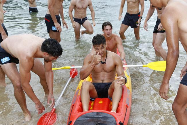 Gold Coast Suns training at Palm Beach. Pictured in the canoe is Sean Lemmens (front) and David Swallow (back). Picture: Tertius Pickard