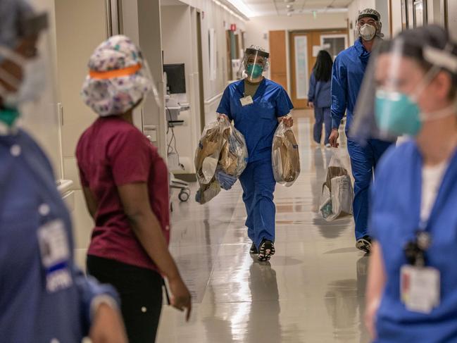 Somehow, tens of thousands of health workers have lost their jobs in the US. Picture: AFP/Getty