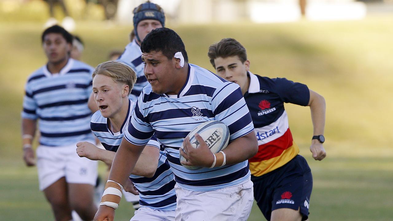 GPS1's Edwin Langi with the ball.