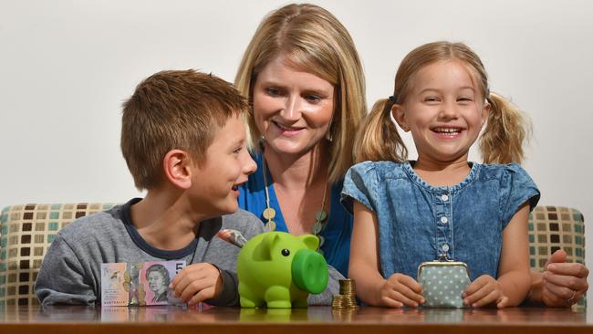 Hugo - 7yrs, Katie Costa and Penelope - 5yrs pose for a photograph at  home in Grange, Adelaide on Tuesday the 6th of March 2018. Money Saver story on  the most important money lessons parents should teach their children. (AAP/ Keryn Stevens)