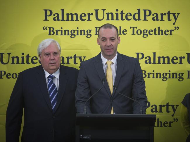 Kristian Rees (centre) and Clive Palmer during the latter’s political stint in 2014.