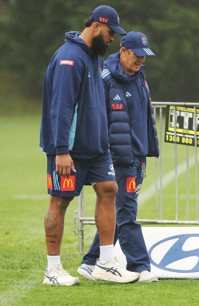 Payne Haas and Craig Bellamy walk the sidelines at Blues training. Picture: Rohan Kelly