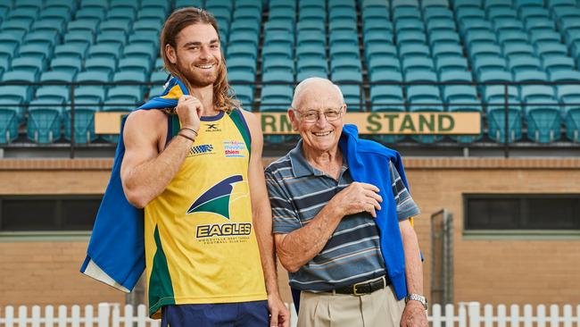 Fourth-generation Eagle, Jordan Foote poses for a picture with his grandfather John Foote after signing with Woodville-West Torrens from Sydney. Picture: Matt Loxton