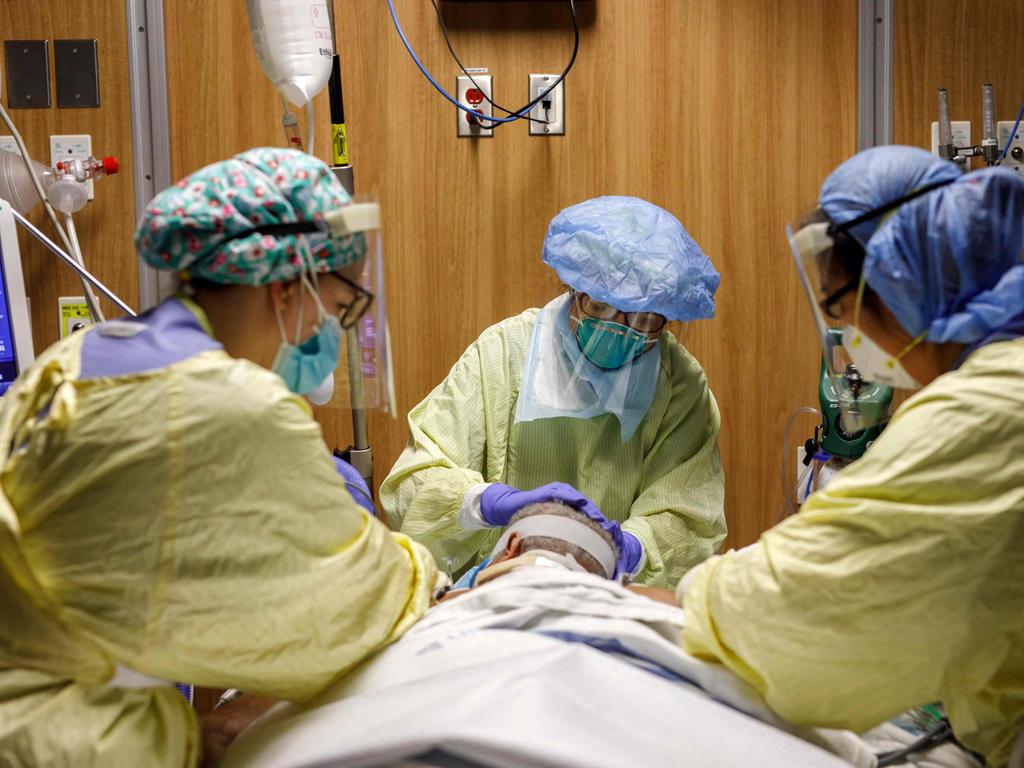 Healthcare workers adjust ventilator tubes at Humber River Hospital’s Intensive Care Unit, in Toronto, Ontario, Canada, on April 29, 2021. Picture: Cole Burston/AFP