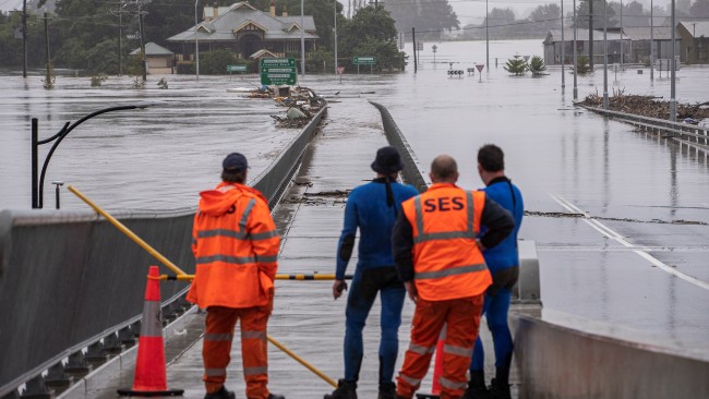 State Emergency Service members are seen near a flooded area in Windsor, Sydney's north-west, on March 4. Picture: Getty