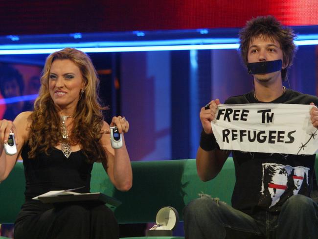 Merlin Luck with presenter Gretel Killeen following his eviction in 2004.