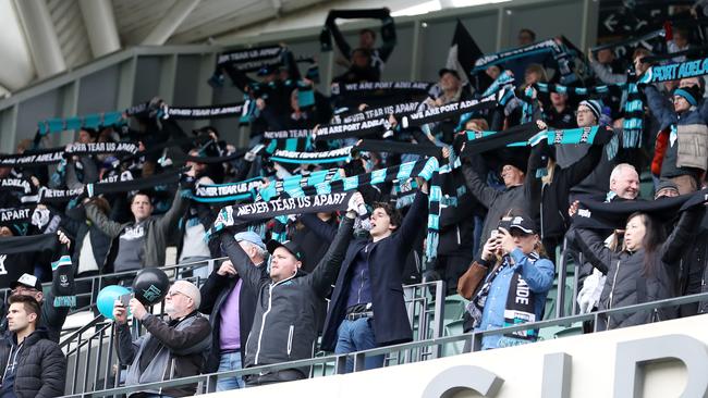 Power fans singing ‘Never Tear Us Apart’ at Adelaide Oval. Picture: Sarah Reed.