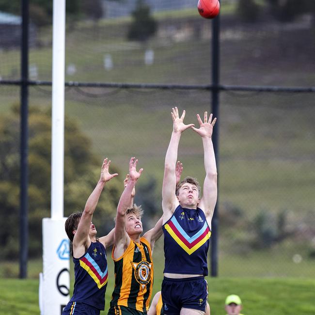 Noah Holmes, right, leads the pack in a marking contest. Picture: CHRIS KIDD