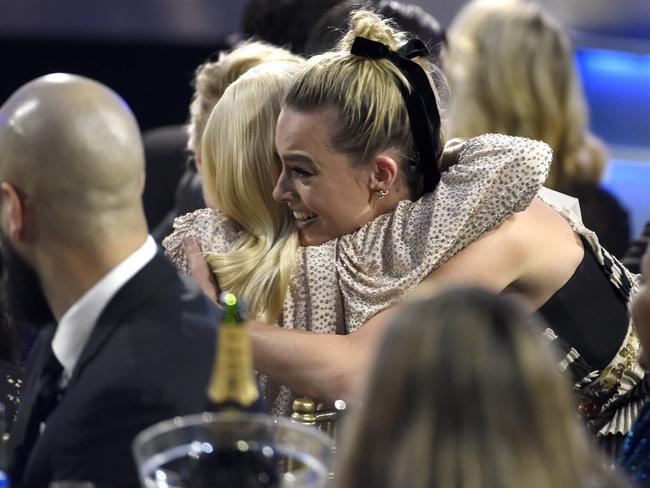 Margot Robbie hugs fellow nominee Saoirse Ronan before Robbie walking on stage to accept the award best actress in a comedy for “I, Tonya” at the 23rd annual Critics’ Choice Awards. Picture: AP