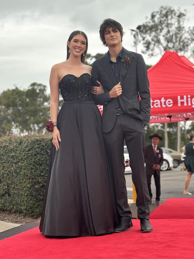 The students of Urangan State High School arriving at their formal.