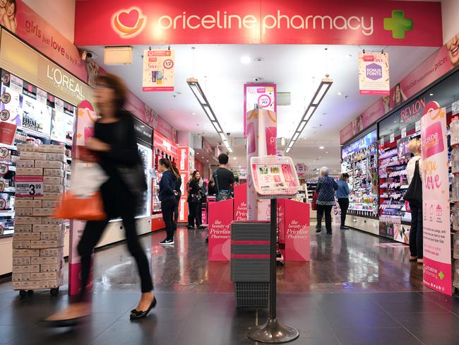 A shopper leaves a Priceline Pharmacy store in Sydney on Thursday, April 20, 2017. Australian Pharmaceutical Industries expects to boost its Priceline Pharmacy network by at least 20 stores during the current financial year and to lift its full-year net profit by at least 10 per cent. (AAP Image/Paul Miller) NO ARCHIVING