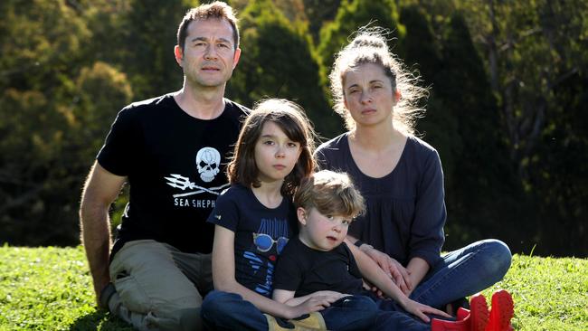 Julia Malcolm, right, with husband Jean-Philippe Pector and their children Morgane, 9, and Felix, 2 on their property in the Otway ranges in Victoria. Picture: David Geraghty