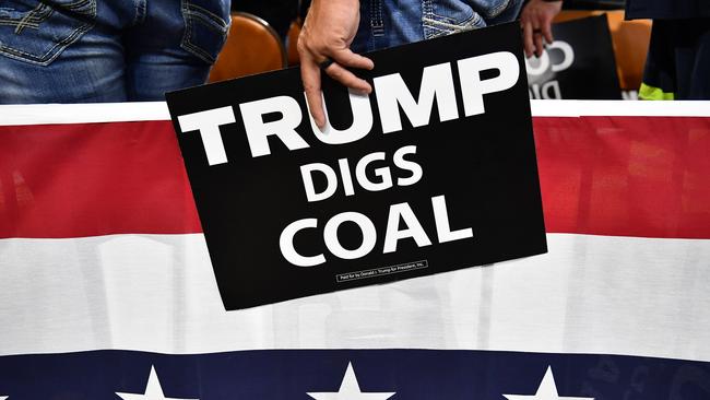 Supporters of US President Donald Trump attend a political rally at Charleston Civic Center in Charleston, West Virginia. Picture: AFP