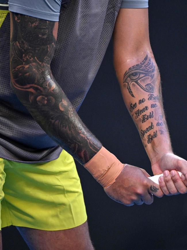 Heavily tattooed arms of Nick Kyrgios. Picture: William West / AFP