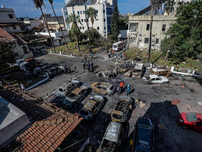 epa10925085 The scene at Al Ahli hospital in Gaza 18 October 2023 following Tuesday's blast after the building was hit by an air strike. According to Palestinian authorities in Gaza hundreds of people have been killed in an airstrike to the hospital in Gaza on 17 October. Israel has denied responsibility and said a Hamas rocket misfire caused the blast. More than 3,000 Palestinians and 1,400 Israelis have been killed according to the Israel Defense Forces (IDF) and the Palestinian Health authority since Hamas militants launched an attack against Israel from the Gaza Strip on 07 October. Israel has warned all citizens of the Gaza Strip to move to the south ahead of an expected invasion.  EPA/MOHAMMED SABER  Picture: Mohamed Saber/EPA/AAP