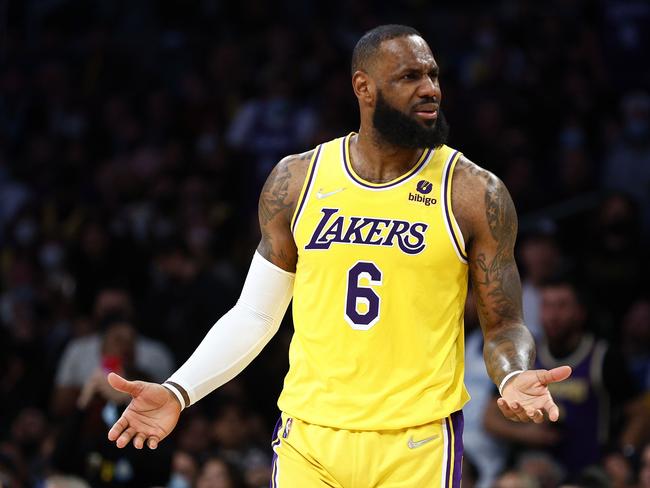 LOS ANGELES, CALIFORNIA - FEBRUARY 08: LeBron James #6 of the Los Angeles Lakers reacts after a technical foul against the Milwaukee Bucks in the second quarter at Crypto.com Arena on February 08, 2022 in Los Angeles, California. NOTE TO USER: User expressly acknowledges and agrees that, by downloading and/or using this Photograph, user is consenting to the terms and conditions of the Getty Images License Agreement.   Ronald Martinez/Getty Images/AFP == FOR NEWSPAPERS, INTERNET, TELCOS & TELEVISION USE ONLY ==