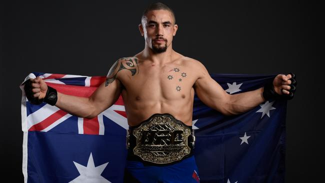 Robert Whittaker will defend his middleweight title at Marvel Stadium in October.