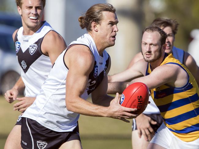 Southport Sharks player Rhys Clark in action against Sydney University in Round 16 of the NEAFL at Fankhauser Reserve on Saturday, July 21. Picture credit: TJ Yelds, NEAFL.