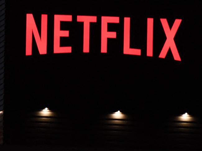 (FILES) The Netflix logo is seen on the Netflix, Inc. building on Sunset Boulevard in Los Angeles, California on October 19, 2021. Netflix on July 19, 2023 said subscriptions to the streaming television service climbed to more than 238 million in the wake of its crackdown on password sharing. Netflix finished the recently ended quarter with an addition 5.9 million subscribers and a profit of $1.5 billion, according to an earnings release. (Photo by Robyn Beck / AFP)