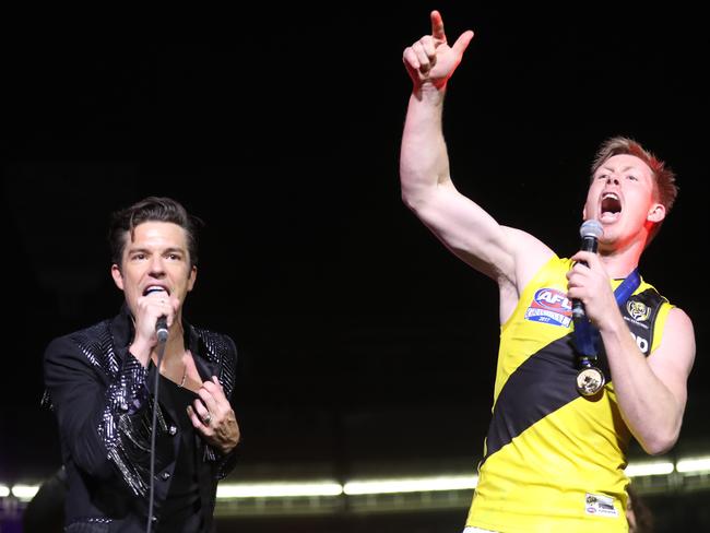 Jack Riewoldt joined Brandon Flowers and The Killers on stage to sing Mr Brightside. Picture: Alex Coppel