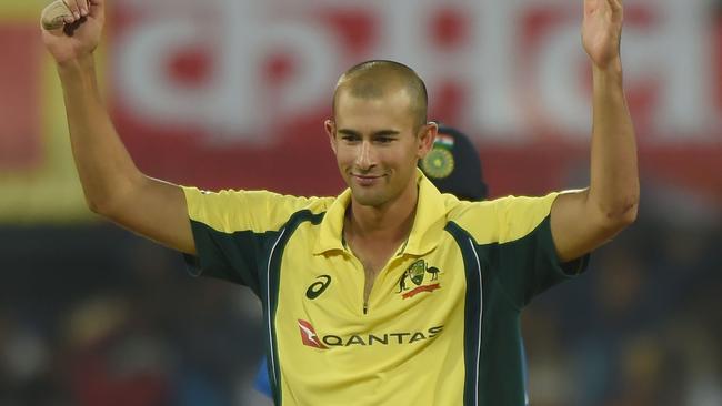 Agar celebrates after taking the wicket of Indian captain Virat Kohli during the third one-day international in September. Pic: Getty