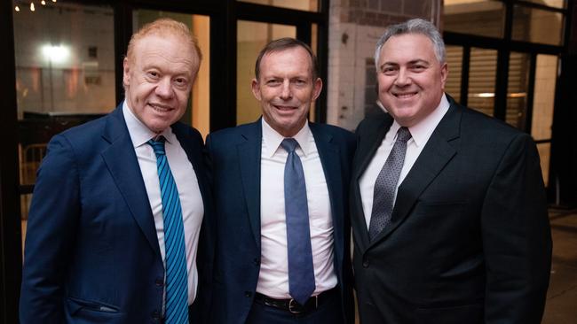 Anthony Pratt, former Australian prime minister Tony Abbott, and Ambassador Joe Hockey are seen at the farewell party for Australia's ambassador to the US, in Washington.