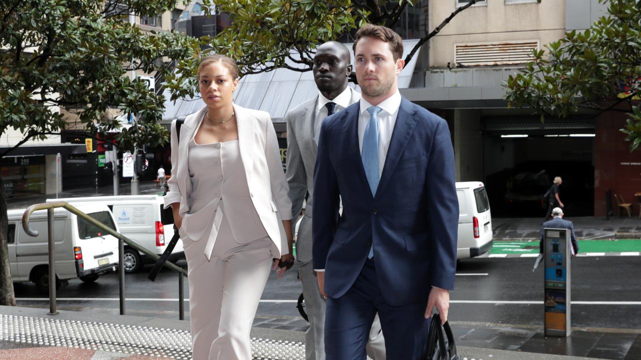 Ruon Tongyik (C) arrives at the Downing Centre in Sydney on the Tuesday, March 5. Picture: Christian Gilles / NewsWire