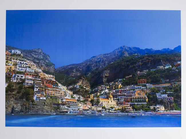 <b>Wall mount of Positano: </b>We were going to buy a similar shot, but it was $10,000 so we did it ourselves. It’s a constant reminder of a five-week European holiday of a lifetime.