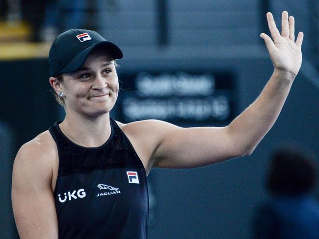 Australian Ash Barty celebrates after defeating Sofia Kenin of the US at the Adelaide International WTA women's singles tennis tournament in Adelaide on January 7, 2022. (Photo by Brenton Edwards / AFP) / -- IMAGE RESTRICTED TO EDITORIAL USE - STRICTLY NO COMMERCIAL USE --