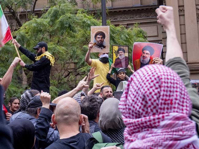 Anti War protest march through the streets of Sydney CBD. Protesters are carrying pictures of Hezbollah leader Hassan Nasrallah who was assassinated by Israel. recently. Photo Jeremy Piper