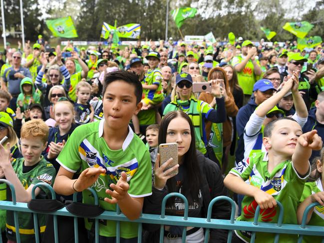 Raiders fans cheer on as they welcome the team home at Raiders Club Belconnen in Canberra, Tuesday, October 8, 2019. (AAP Image/Lukas Coch)