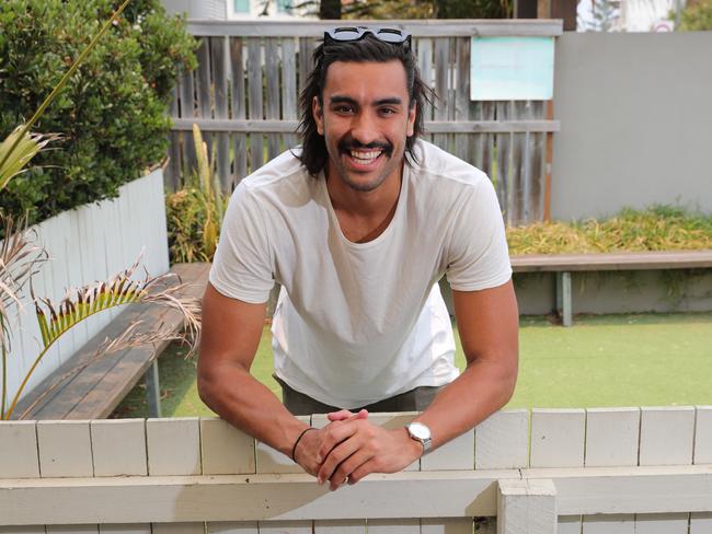 Former Gold Coast Suns AFL player Tom Nicholls, who has recently retired, relaxing at BSKT Cafe at Nobby Beach. Picture Glenn Hampson