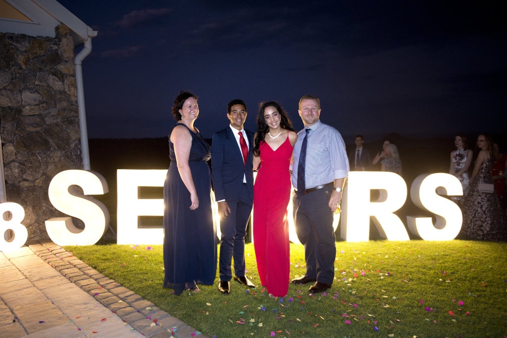 Celebrating the graduation Eden, from left; Bianca Lingard, Semisi Maile, Eden Lingard and Rick Lingard. Eden lingard (graduate thrid from left) wiThe first group of Year 12 students to graduate from TACAP's held their formal at Preston Peak Winery. November 2018. Picture: Bev Lacey