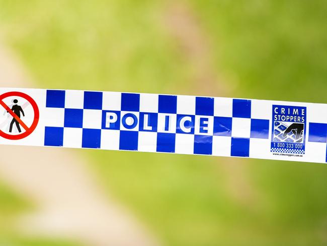 General photograph of Queensland Police and Crime Stoppers tape at crime scene, Sunday, March 8, 2020 (AAP Image/Richard Walker)