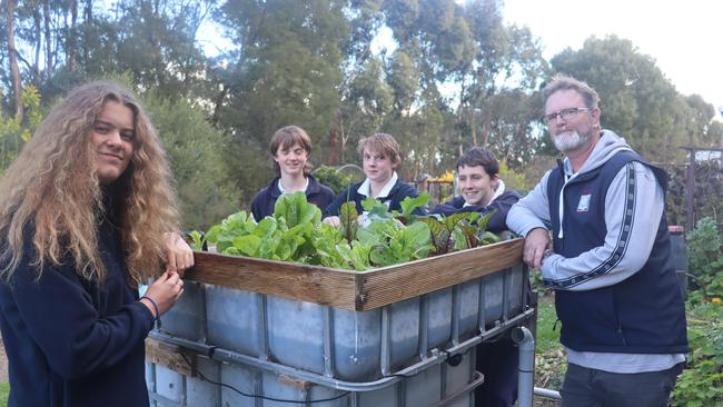 Agriculture teacher Will Vangeninden with students at Terang College.