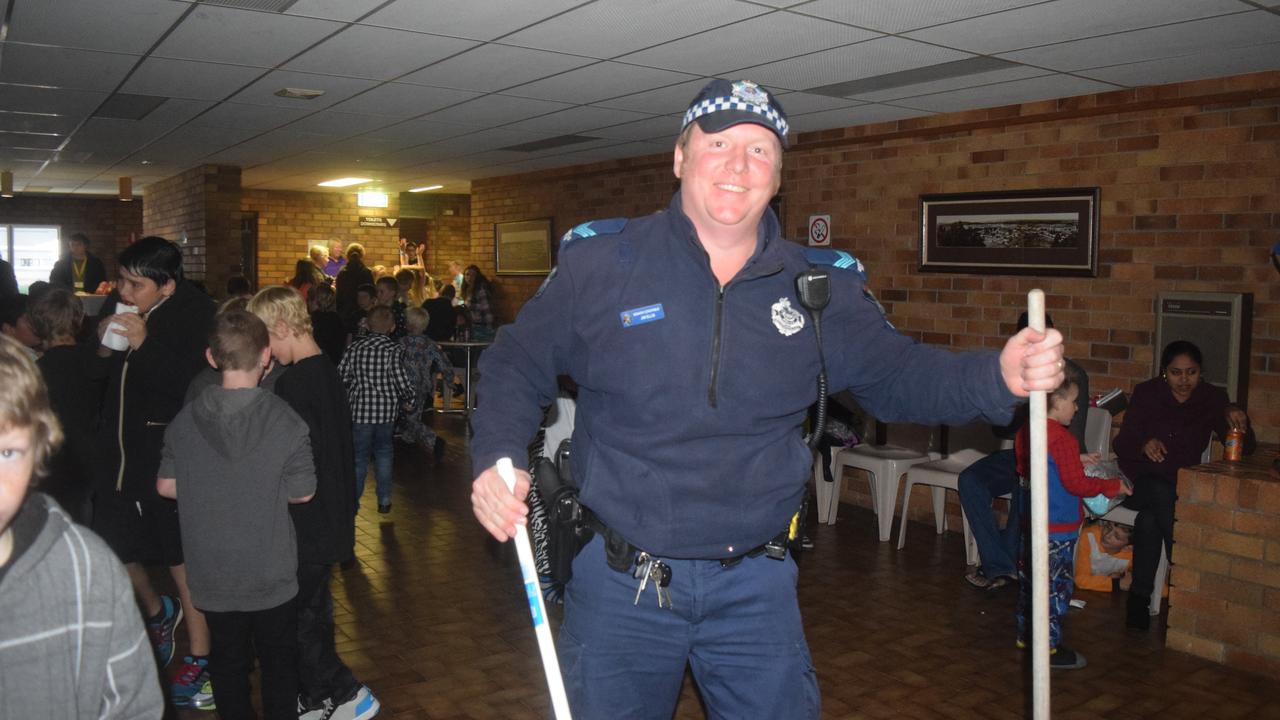 Senior Constable Jim Ellis 'cleans up' the dancefloor at the Blue Light Disco. Photo: Alex Nolan / Stanthorpe Border Post