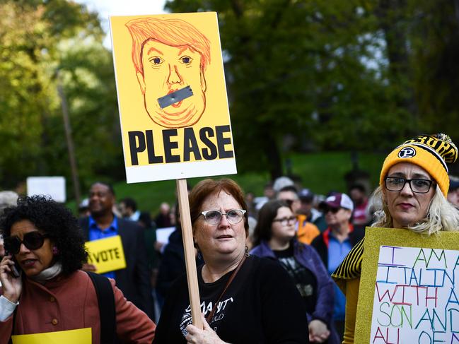 People protesting against US President Donald Trump amid a row over whether his fierce rhetoric at campaign rallies and on Twitter has helped stoke extremism ahead of the midterm elections. Picture: AP