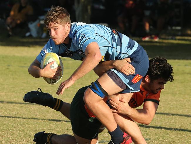 Helensvale Hogs vs Surfers Paradise Dolphins rugby union clash at helensvale hogs rugby club. Helensvale Player No7 Flynn CarsonSurfers Player No6 Jackson SearlPic Mike Batterham