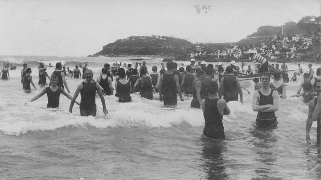 Members of the Sly family in Manly Council's surfboat at Manly. Picture Northern Beaches Library