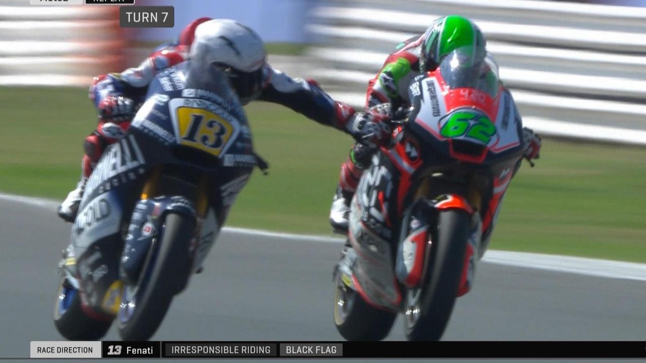 Moto2: Romano Fenati grabs the brake lever of rival Stefano Manzi mid-race.