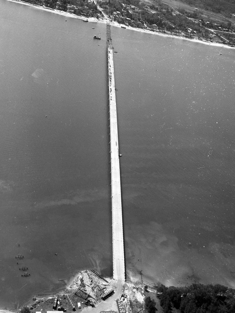 10/4/1963. Aerial view of nearly completed Bribie Island bridge. Picture by Bob Barnes.